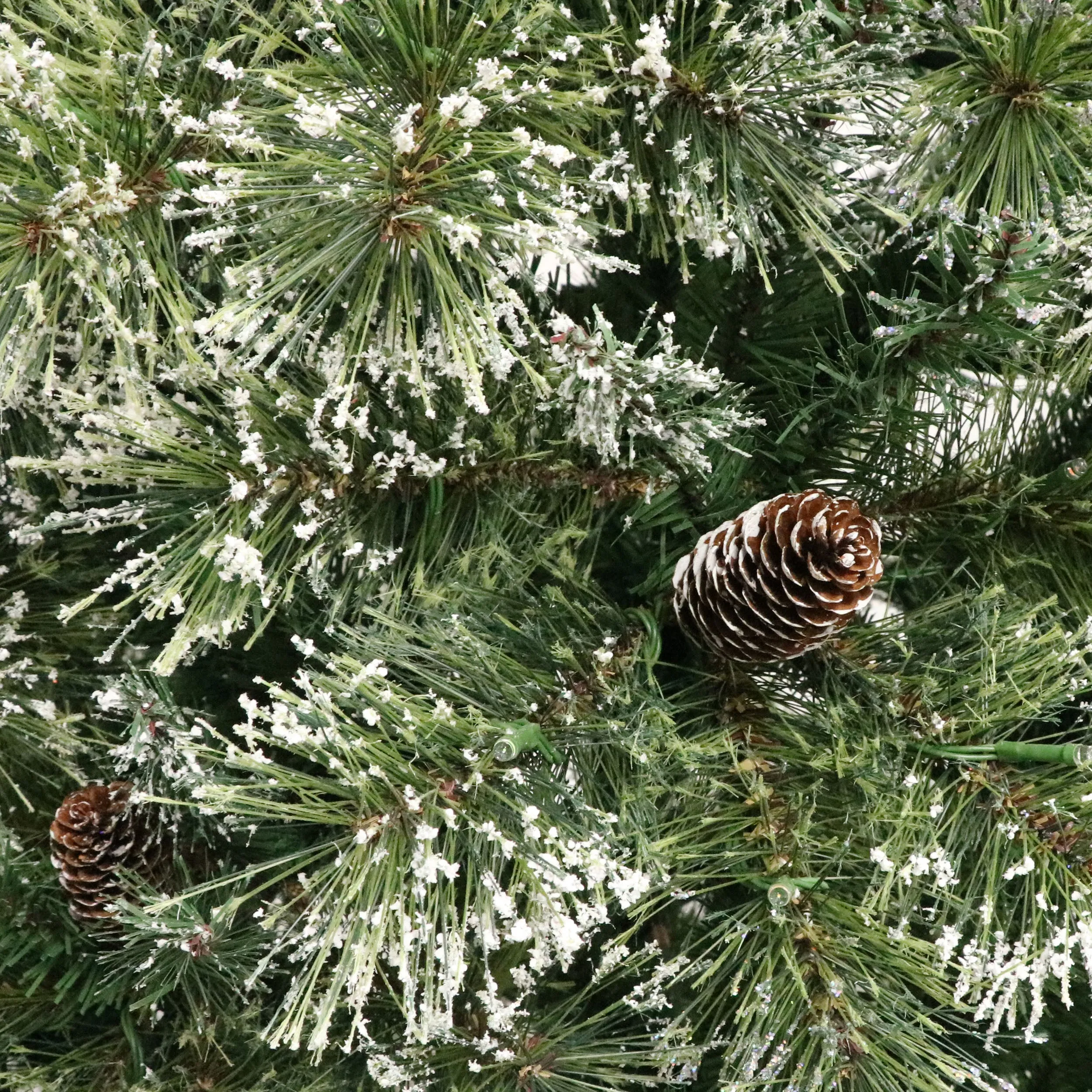 Cashmere Pine and Mixed Needles Pre-Lit Clear LED Hinged Artificial Christmas Tree with Snow and Glitter Branches and Frosted Pinecones - NH812513