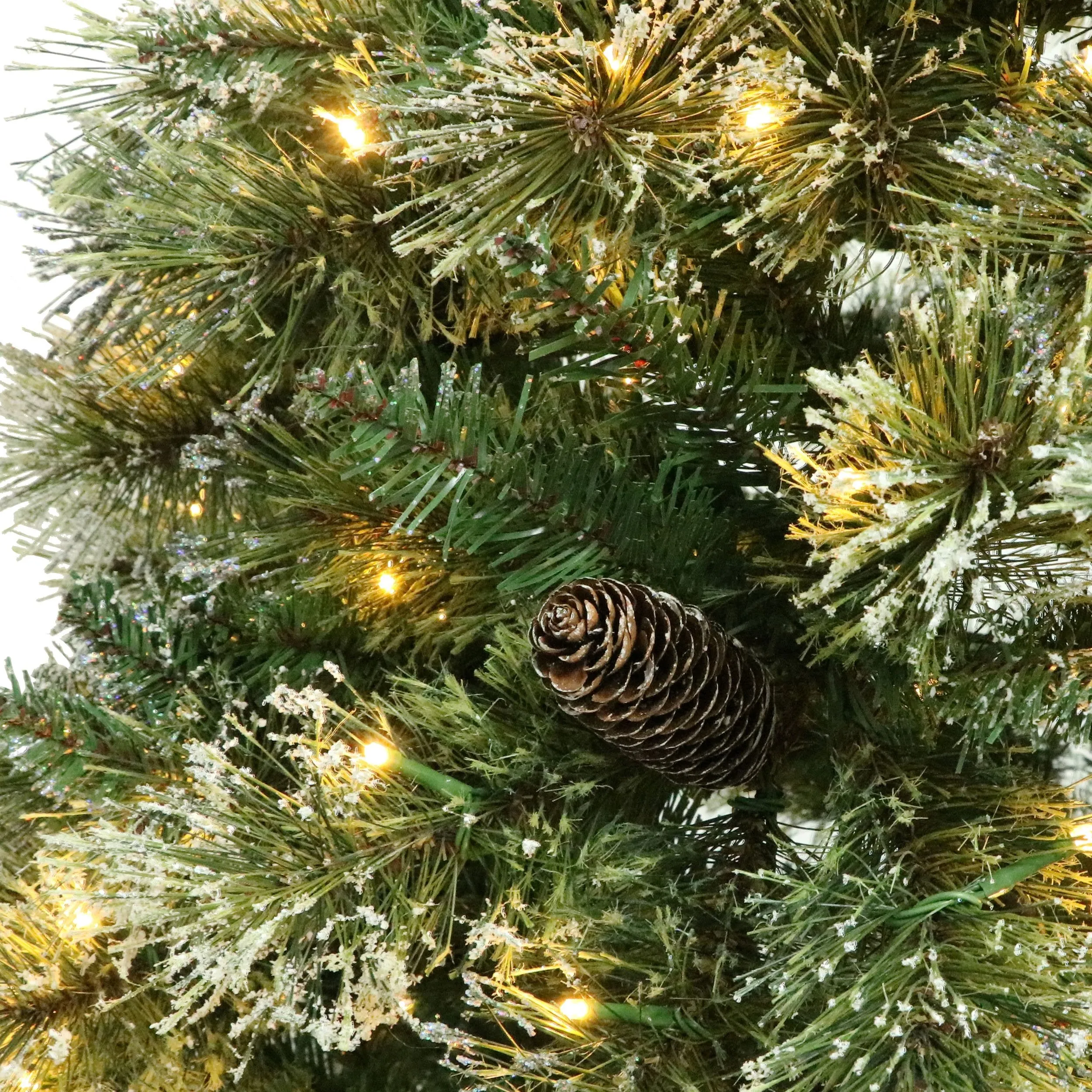 Cashmere Pine and Mixed Needles Pre-Lit Clear LED Hinged Artificial Christmas Tree with Snow and Glitter Branches and Frosted Pinecones - NH812513